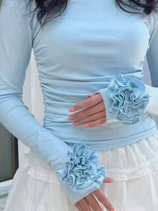 Camiseta elástica con flor azul