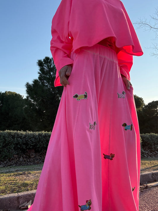 Pantalon rosa con perros salchicha